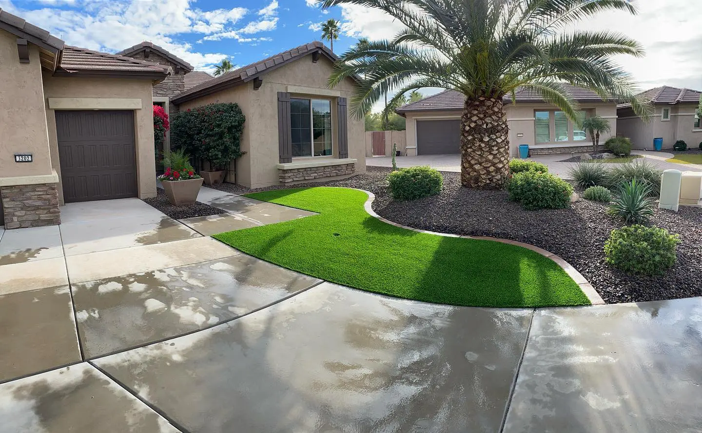 paved driveway in Palm Desert CA with synthetic turf landscaping