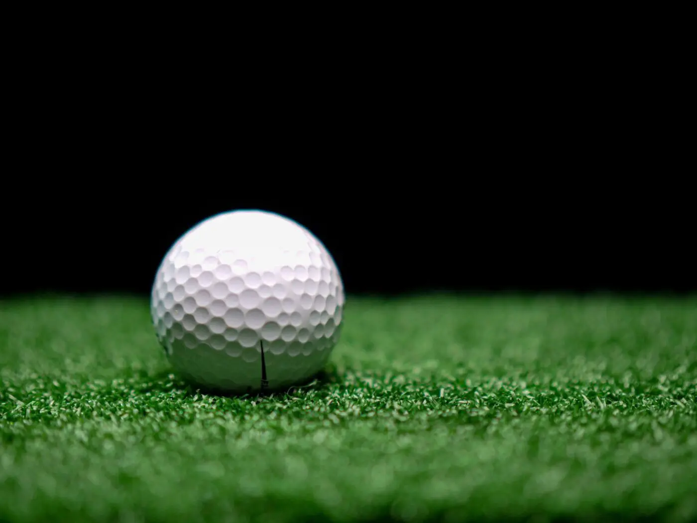 golf ball on the putting green installed by Coachella Valley Turf