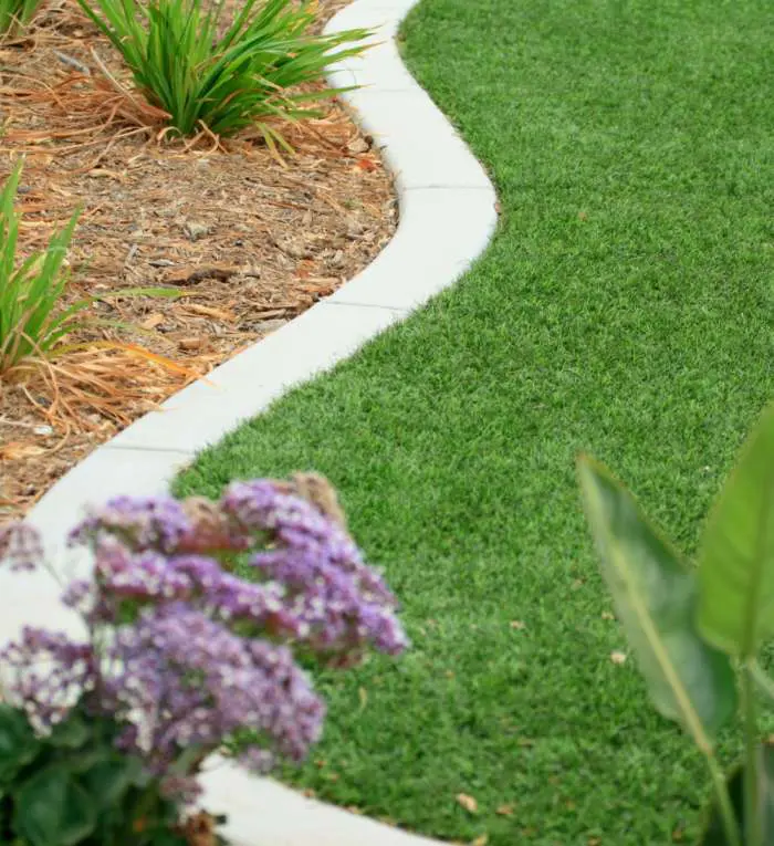 this artificial lawn installed by Coachella Valley Turf stays green all year long
